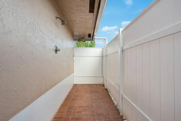 a spacious bedroom with a bed and a couch