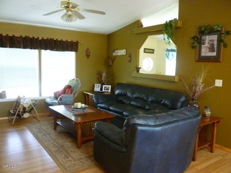 1411 Independence Road Outlook, WA 98938 - Photo 2 of 18 a living room with couches chairs and a coffee table
