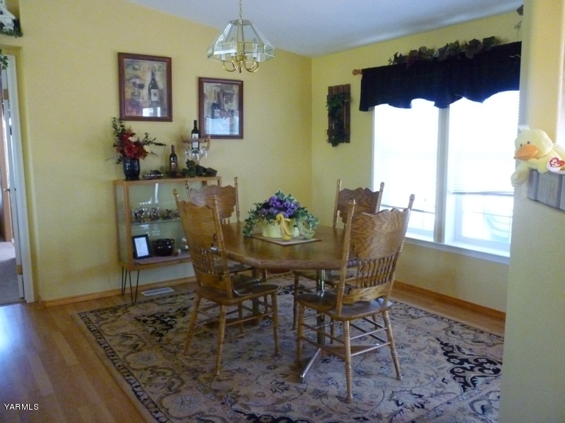 1411 Independence Road Outlook, WA 98938 - Photo 6 of 18 a dining room with furniture and window