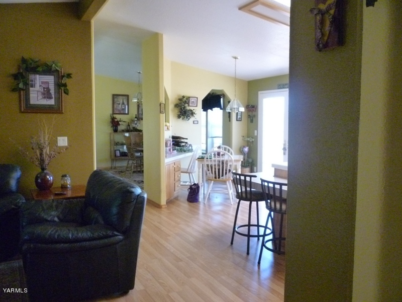 1411 Independence Road Outlook, WA 98938 - Photo 18 of 18 a living room with furniture wooden floor and a table