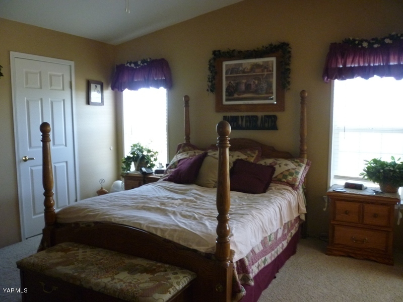 1411 Independence Road Outlook, WA 98938 - Photo 8 of 18 a bedroom with a bed and window