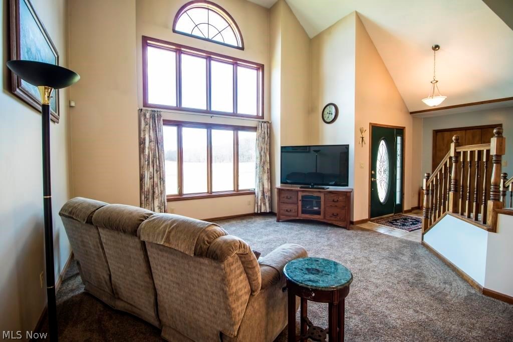 5067 Ayers Road Andover, OH 44003 - Photo 4 of 19 Wall of windows for plenty of natural light and great country views!