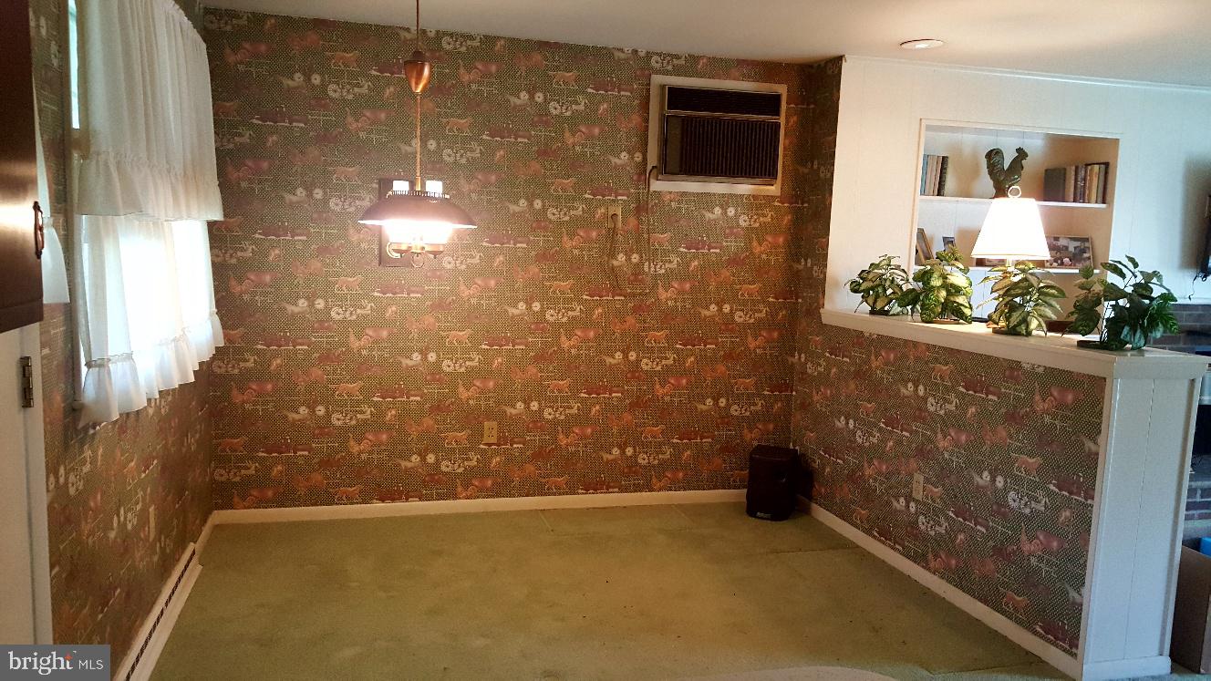 3615 Rosewood Road Reading, PA 19605 - Photo 7 of 22 Dining room with half wall