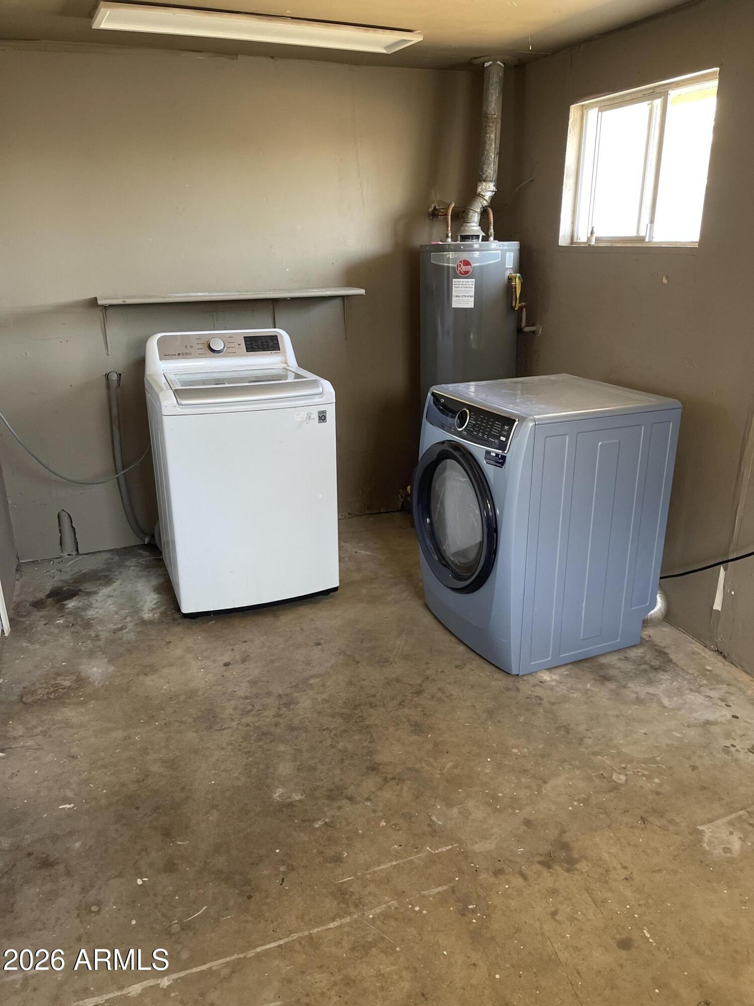 520 West McNeil Street Phoenix, AZ 85041 - Photo 17 of 18 a utility room with dryer and washer