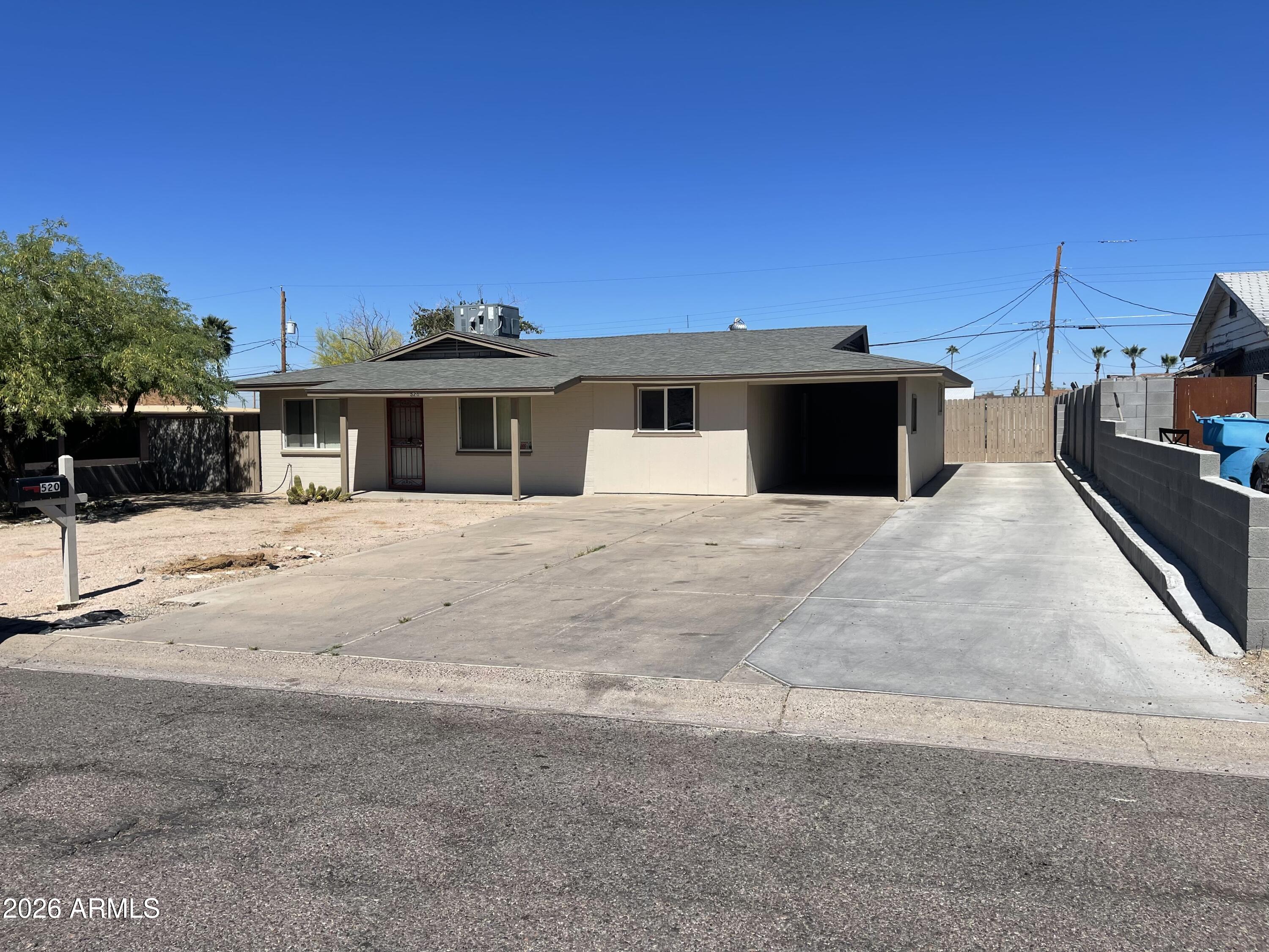 520 West McNeil Street Phoenix, AZ 85041 - Photo 5 of 18 a view of a house with a patio
