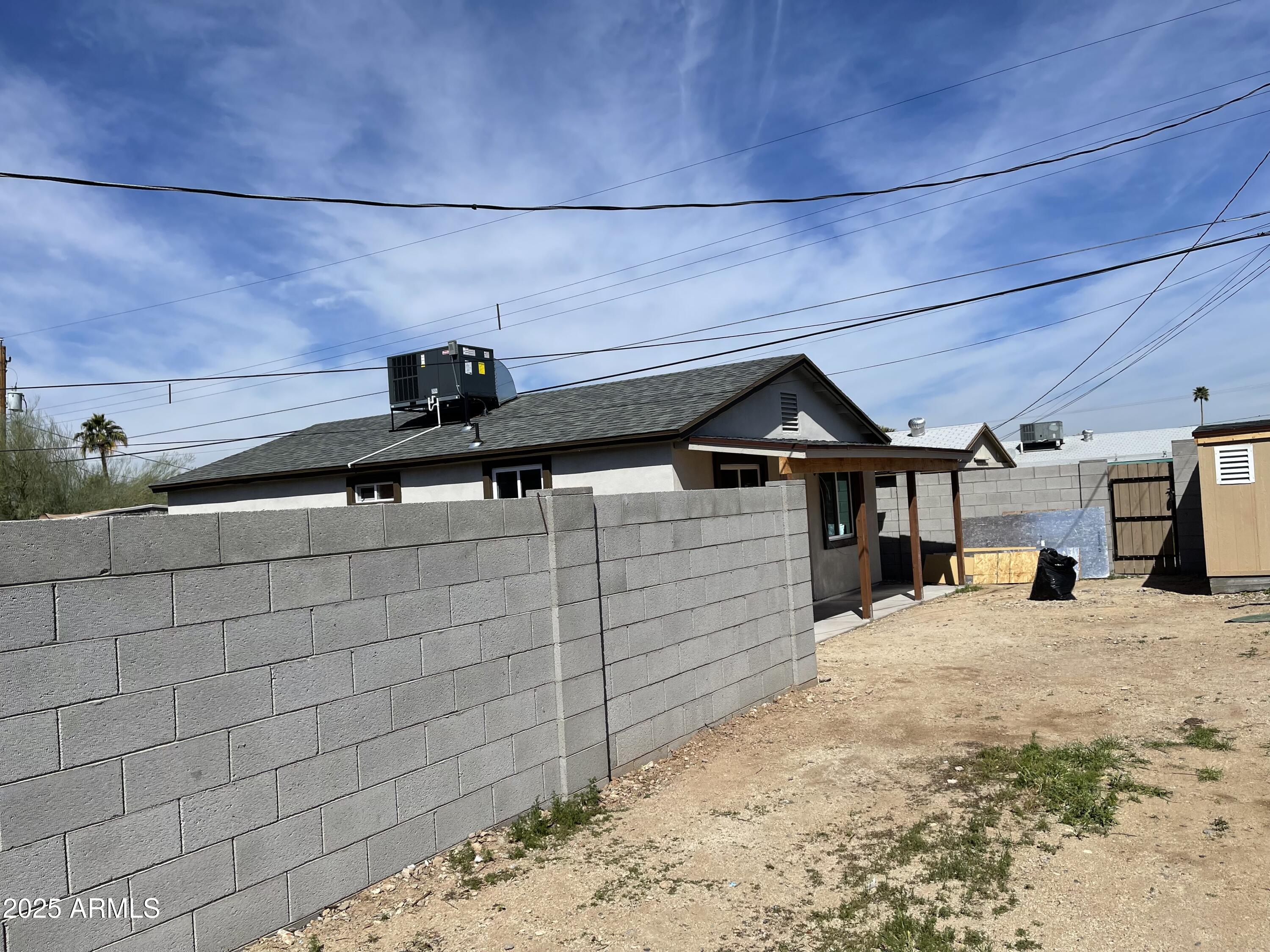 520 West McNeil Street Phoenix, AZ 85041 - Photo 7 of 18 a view of a backyard of the house