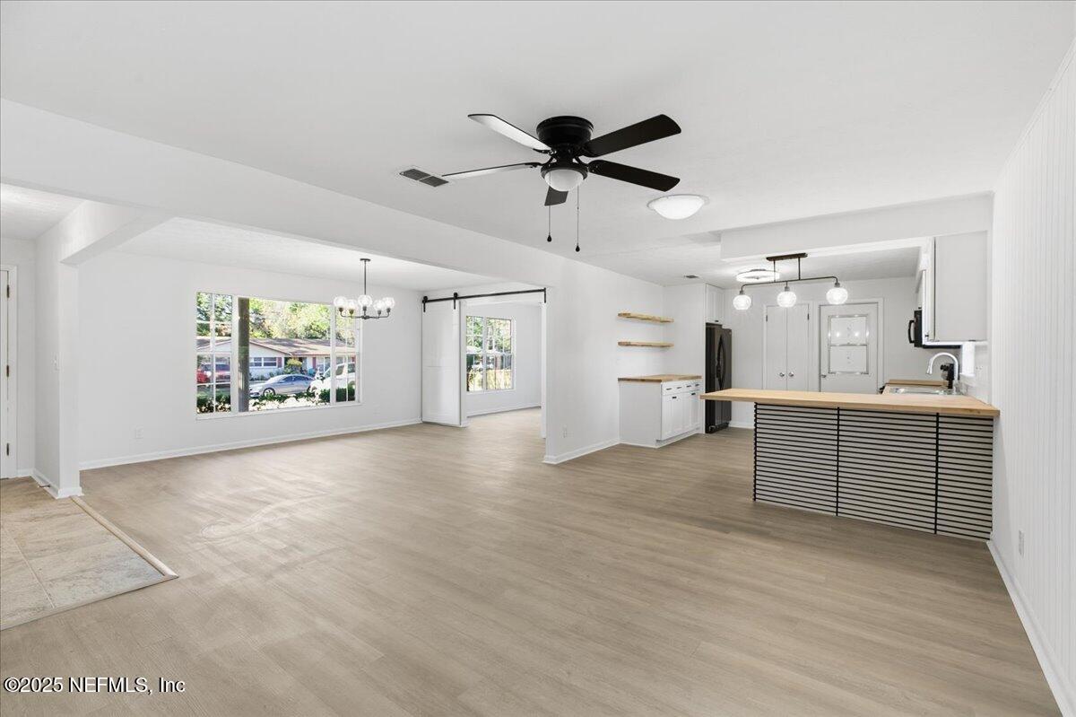 3767 Heath Road Jacksonville, FL 32277 - Photo 5 of 23 a view of a kitchen with a sink and a window