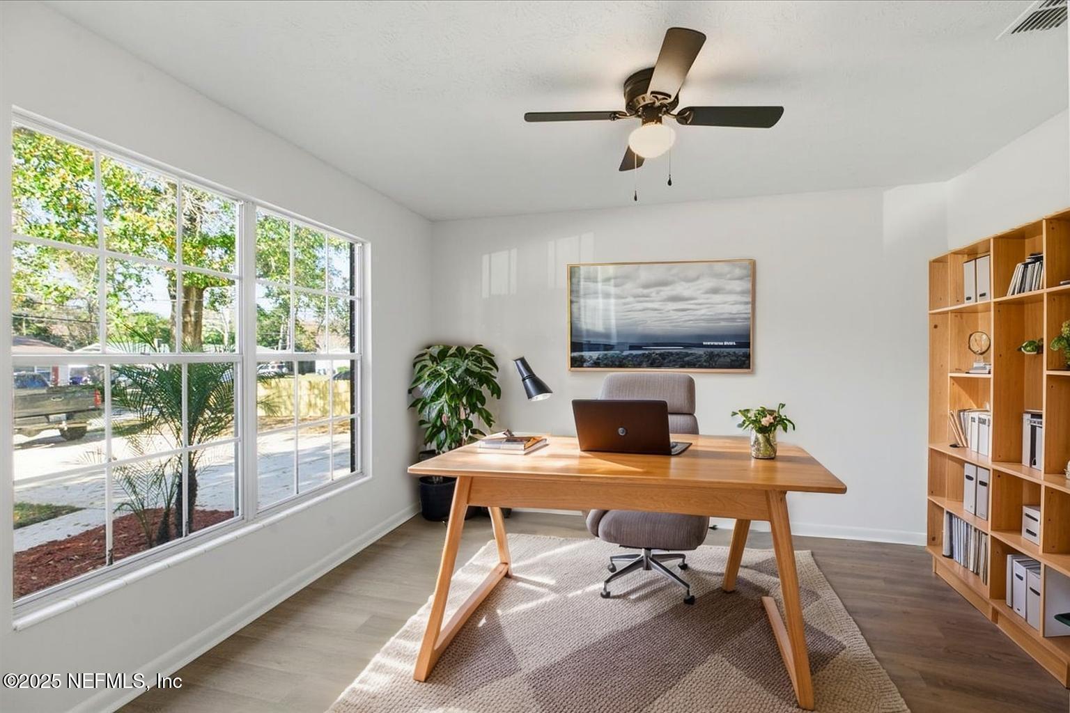 3767 Heath Road Jacksonville, FL 32277 - Photo 10 of 23 a view of a workspace with furniture and a window