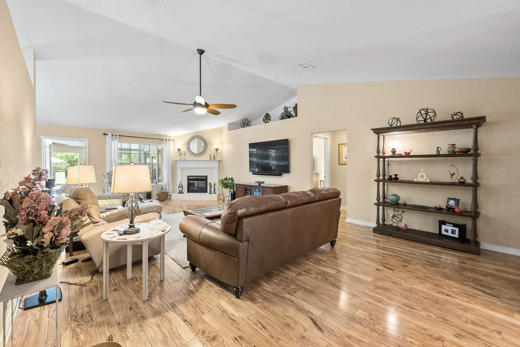 130 Shipwreck Road Santa Rosa Beach, FL 32459 - Photo 11 of 76 a living room with furniture or chandelier and a wooden floor