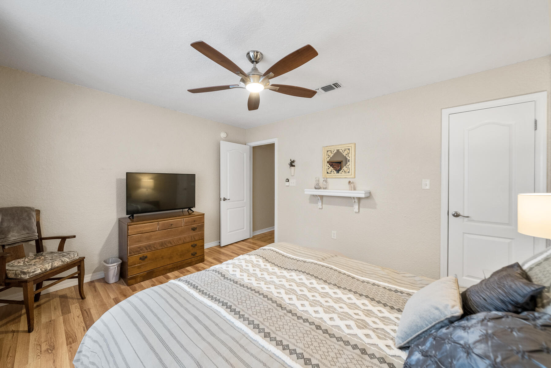 130 Shipwreck Road Santa Rosa Beach, FL 32459 - Photo 18 of 76 a bedroom with a bed and a flat screen tv
