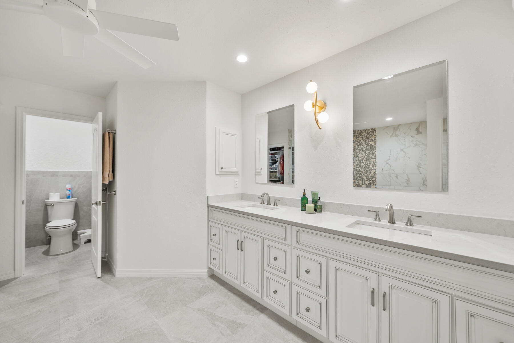 130 Shipwreck Road Santa Rosa Beach, FL 32459 - Photo 22 of 76 a spacious bathroom with a double vanity sink and a mirror