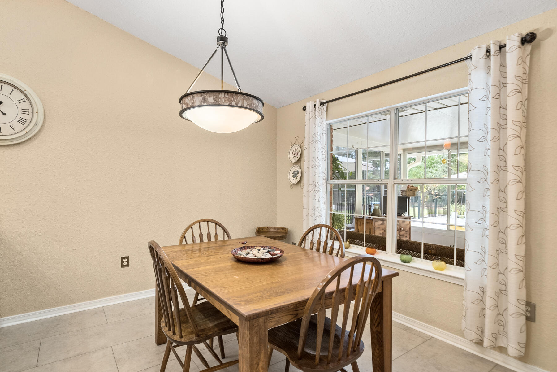 130 Shipwreck Road Santa Rosa Beach, FL 32459 - Photo 29 of 76 a view of a dining room with furniture window and outside view