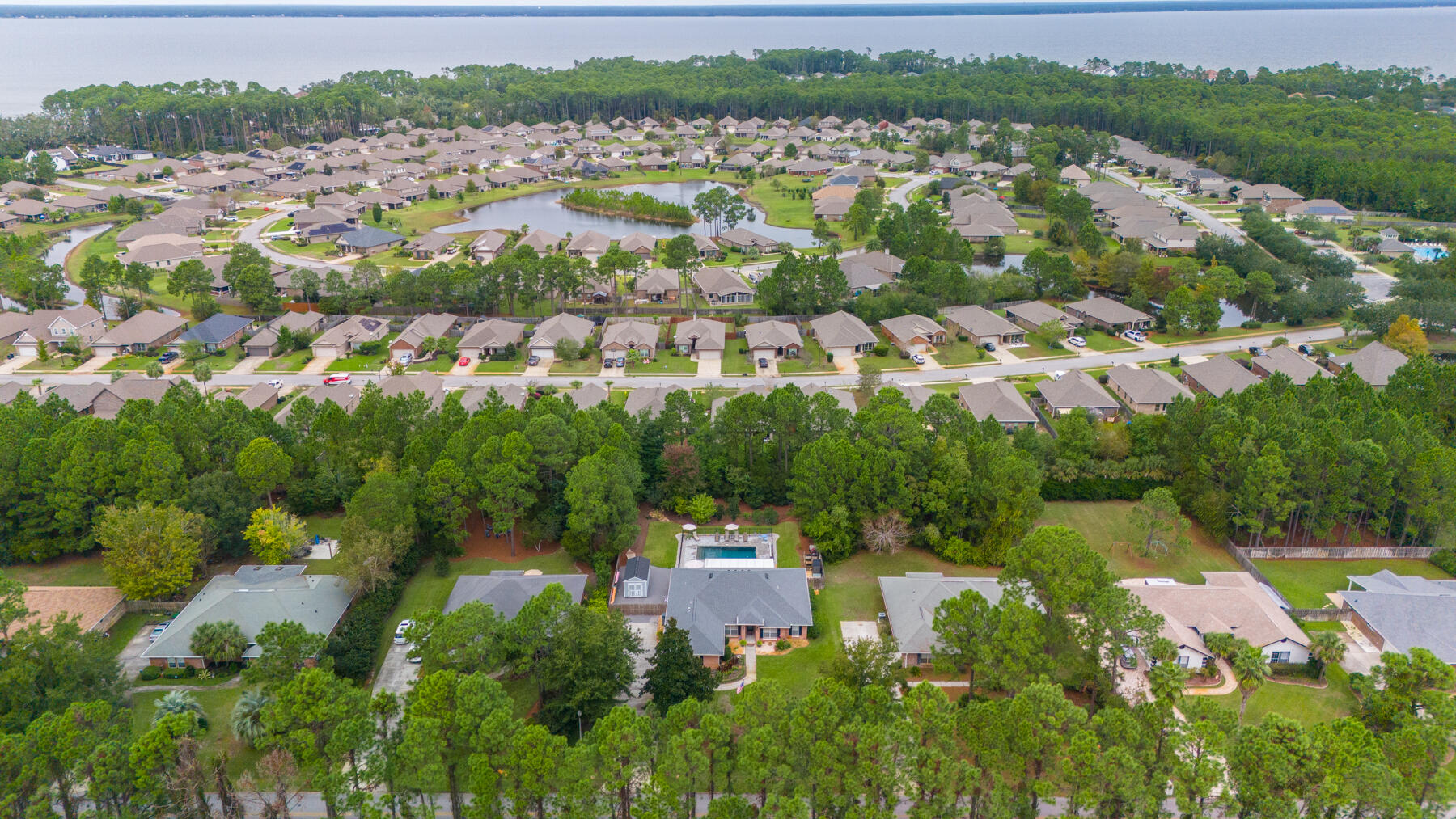 130 Shipwreck Road Santa Rosa Beach, FL 32459 - Photo 33 of 76 an aerial view of residential houses with outdoor space and street view
