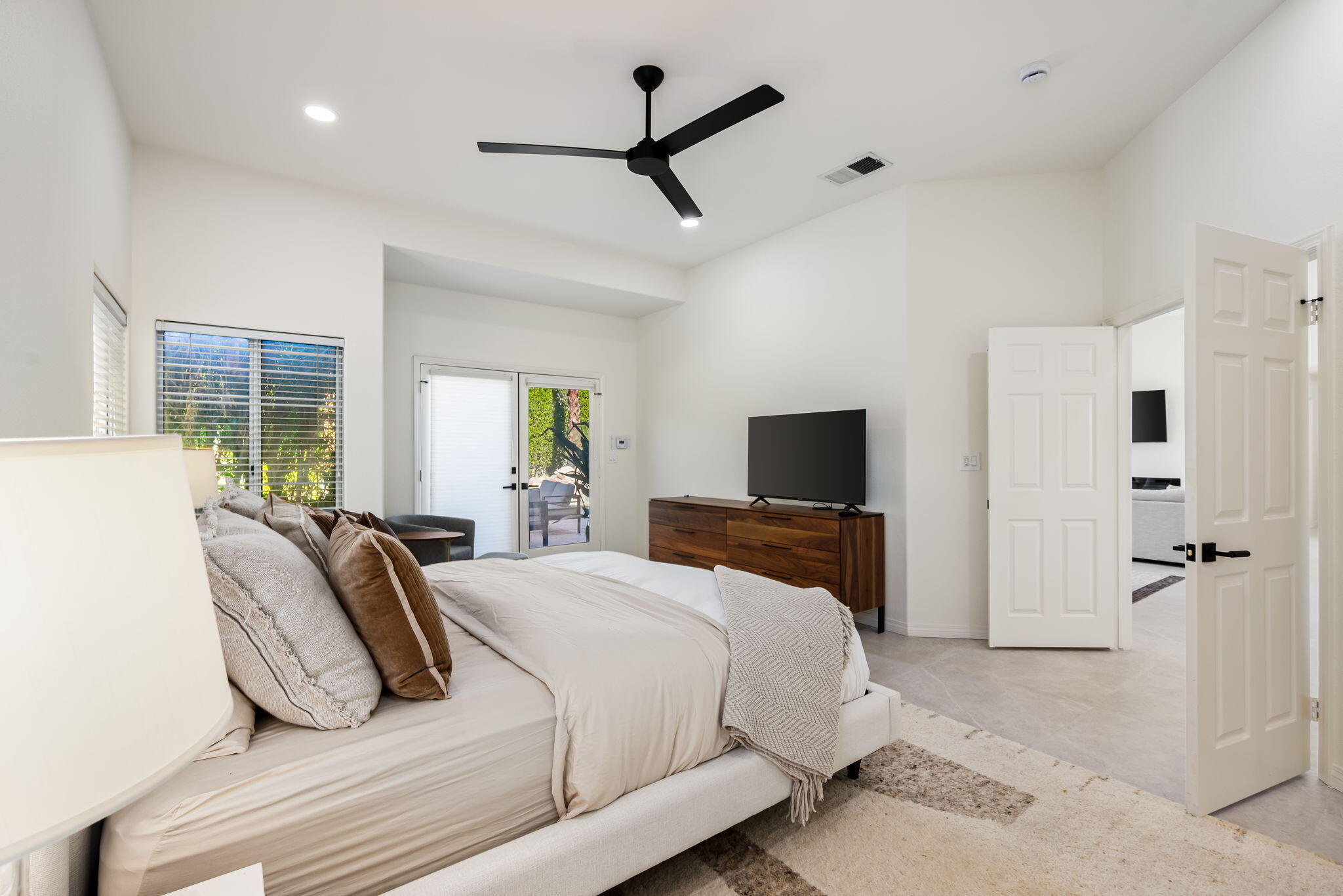 8 Park Mirage Lane Rancho Mirage, CA 92270 - Photo 41 of 51 a bedroom with a bed and a flat screen tv