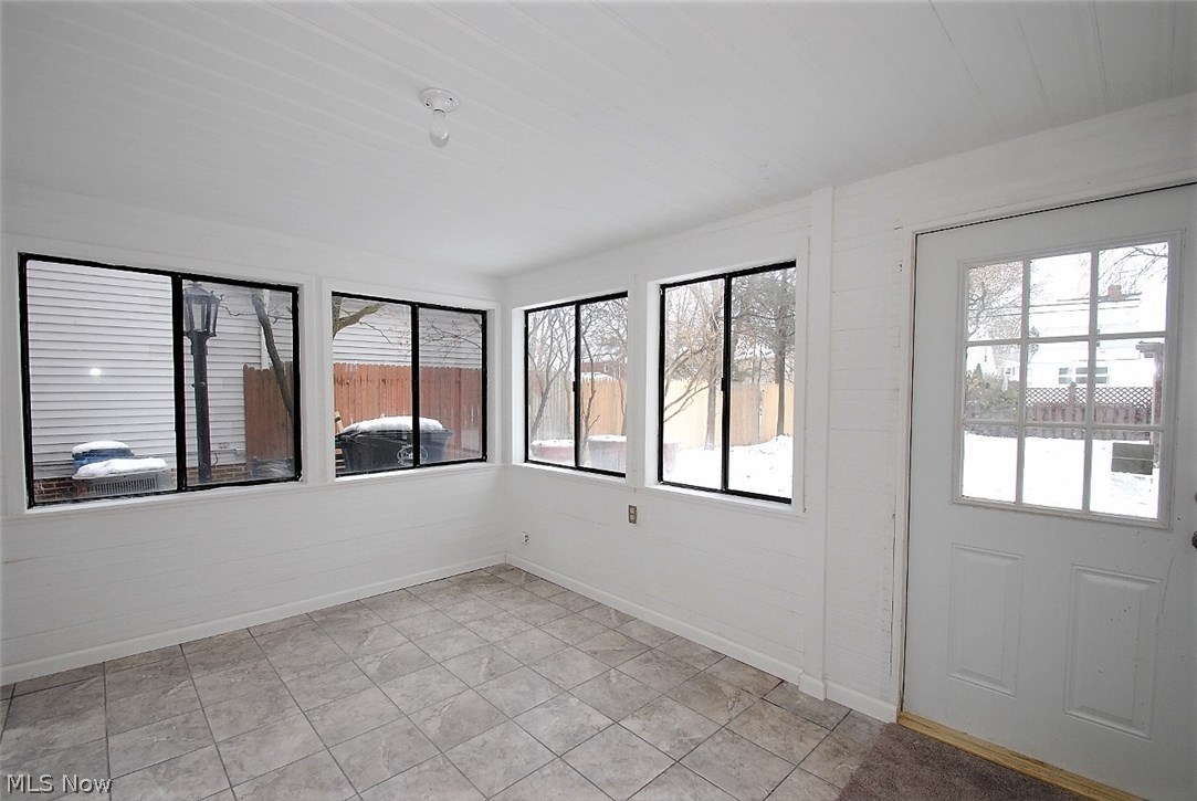 1303 Ford Road Lyndhurst, OH 44124 - Photo 25 of 29 Enclose Sun Room with Entrance to Back Yard