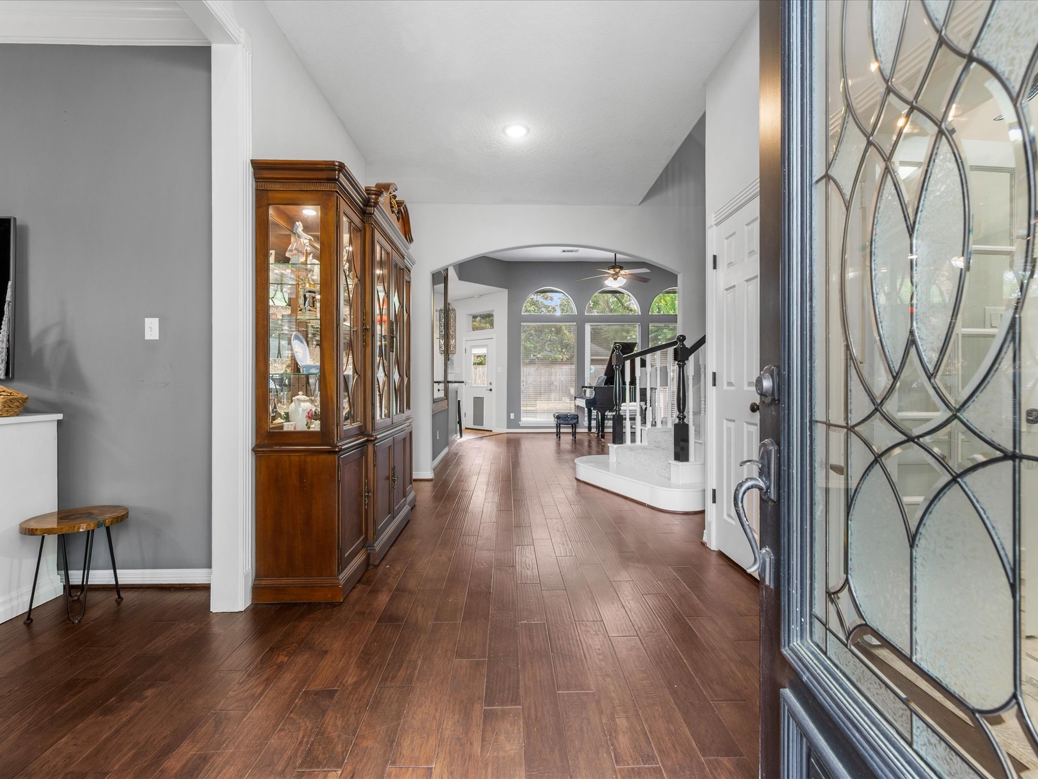 5910 Center Ct Drive Spring, TX 77379 - Photo 7 of 50 Step inside and discover a home that has been thoughtfully transformed from top to bottom, where soaring ceilings, recessed lighting, and a spacious layout create an inviting first impression.