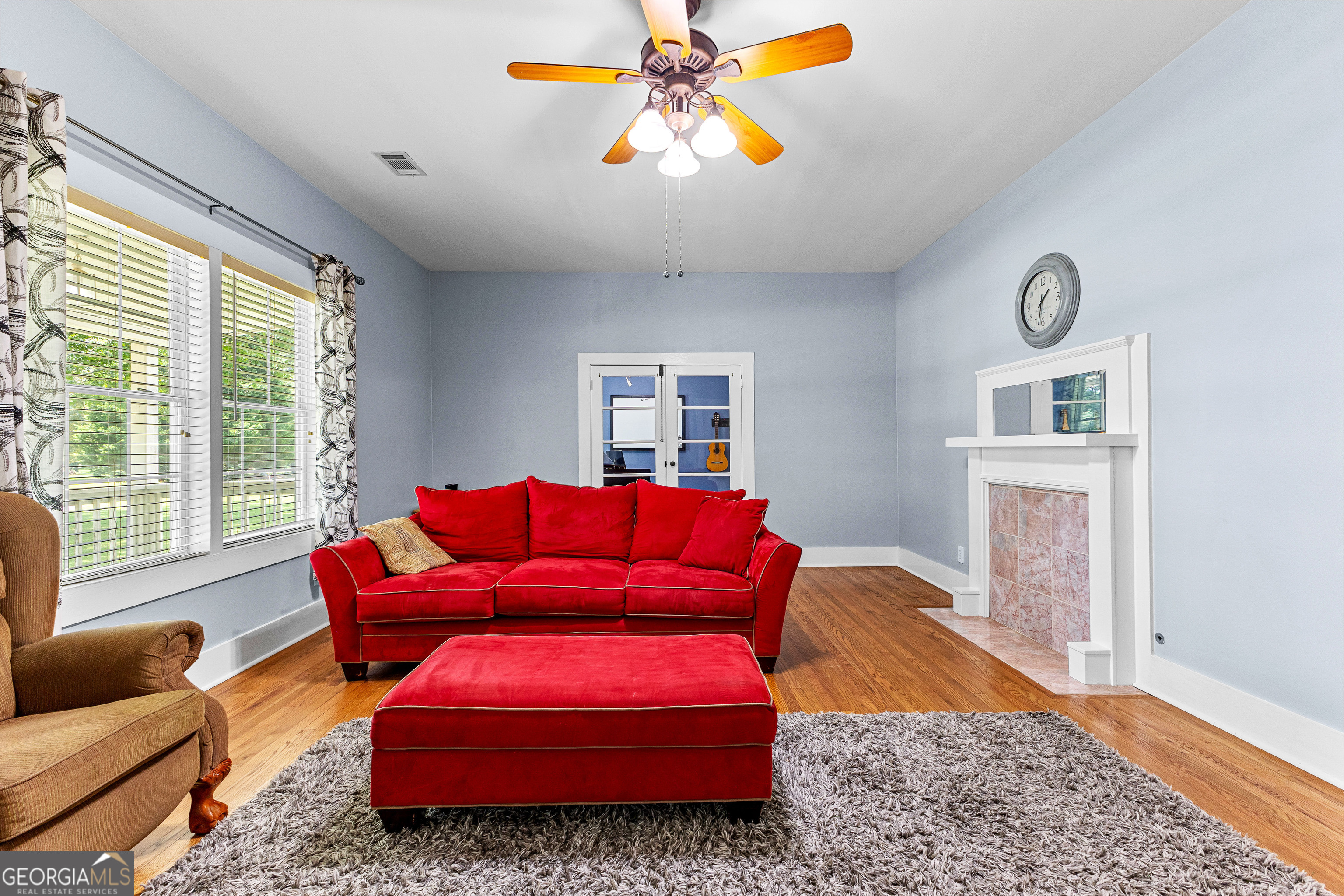 20 Conkle Road Hampton, GA 30228 - Photo 13 of 56 a living room with furniture a couch and a chandelier