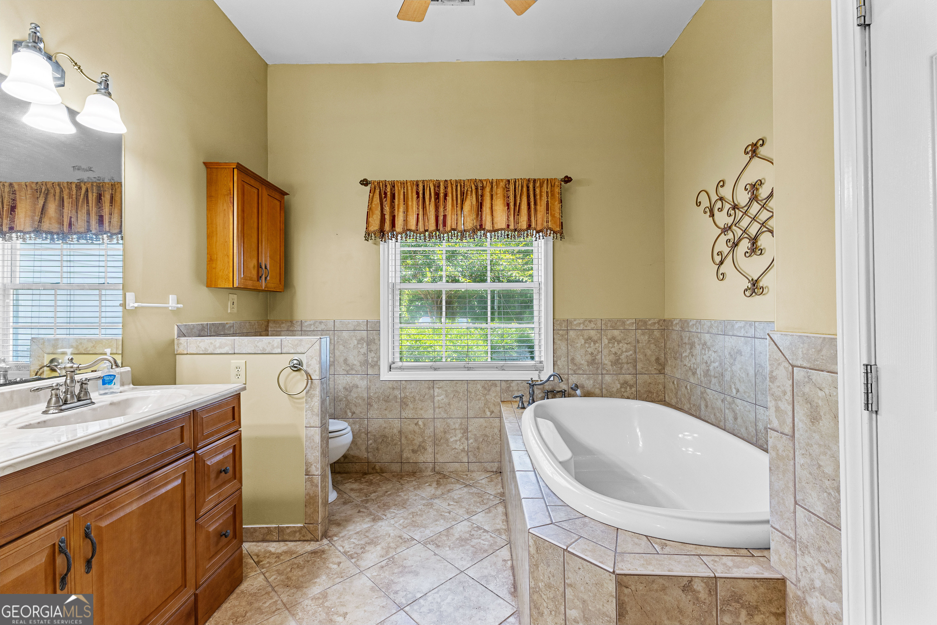 20 Conkle Road Hampton, GA 30228 - Photo 20 of 56 a bathroom with a sink and a bathtub