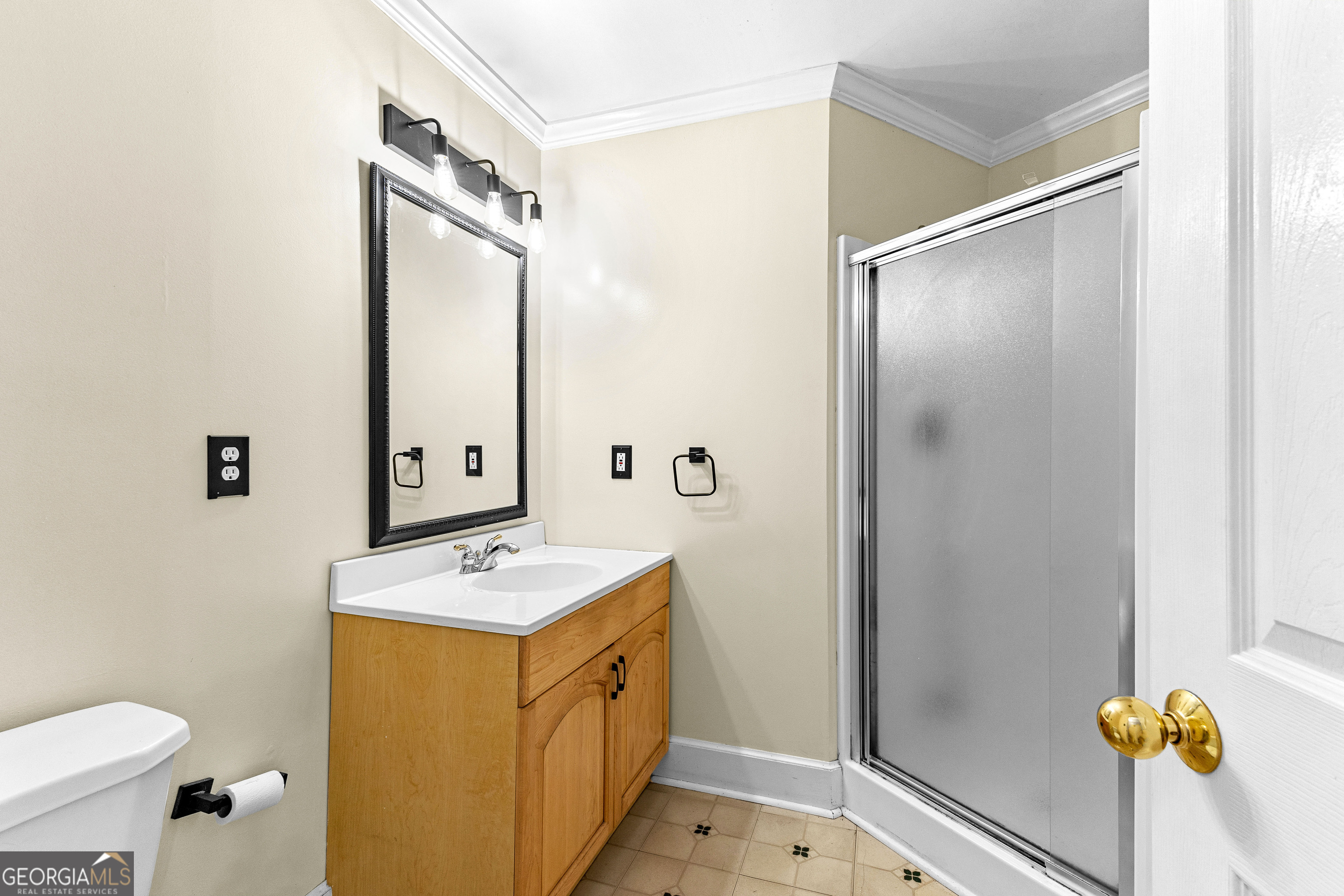 20 Conkle Road Hampton, GA 30228 - Photo 25 of 56 a bathroom with a sink and mirror with toilet