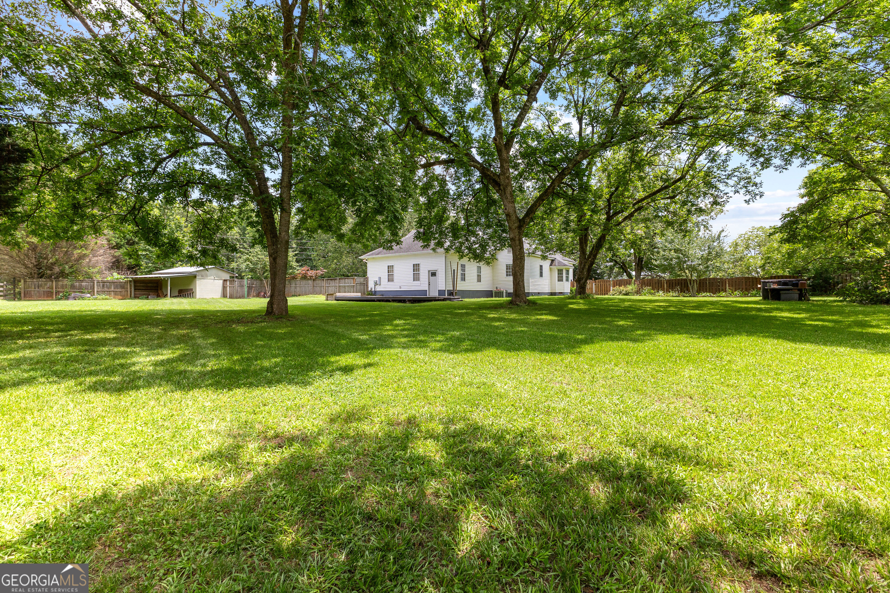 20 Conkle Road Hampton, GA 30228 - Photo 47 of 56 a view of a trees in front of a house