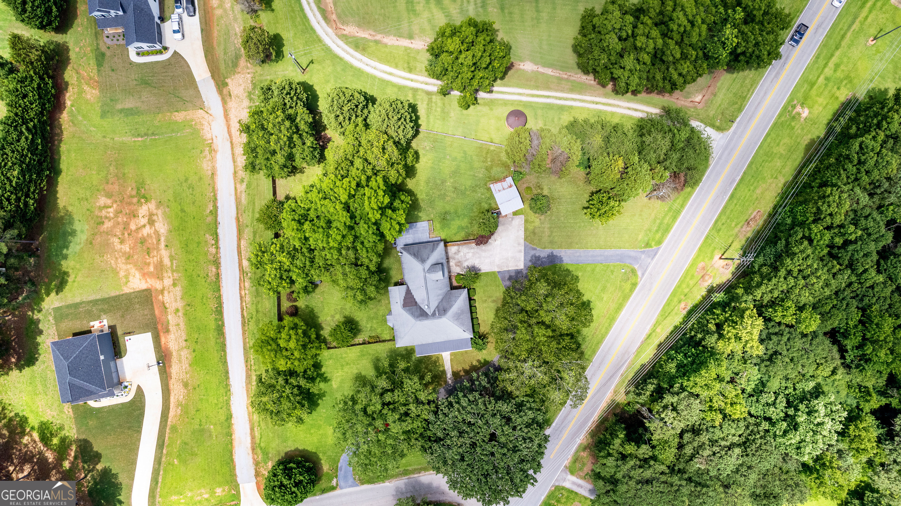 20 Conkle Road Hampton, GA 30228 - Photo 53 of 56 an aerial view of a residential apartment building with a yard