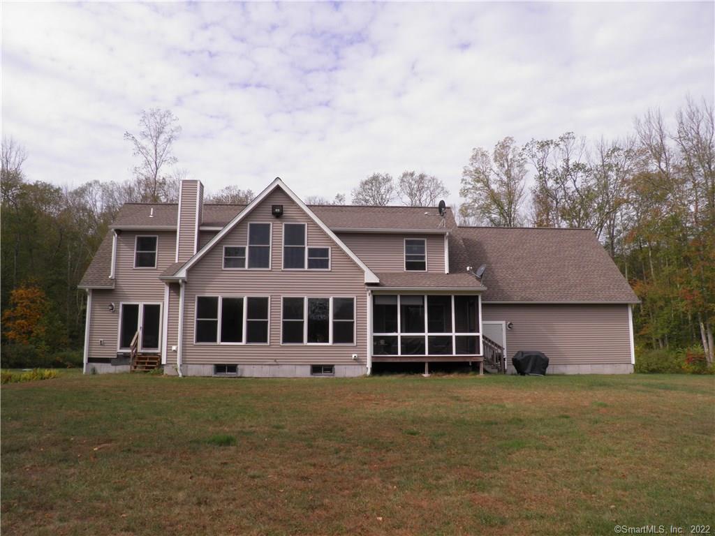 147 Old Town Pound Road Hampton, CT 06247 - Photo 1 of 1 a front view of a house with a yard