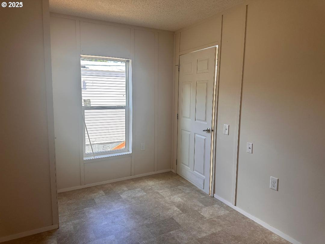 5000 Northeast Stephens Street, Unit 39 Roseburg, OR 97470 - Photo 9 of 9 a view of an empty room with a window