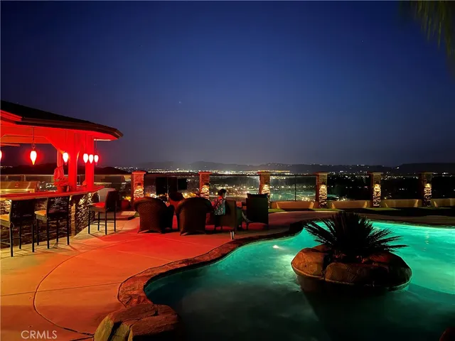 a view of a chairs and tables in the patio