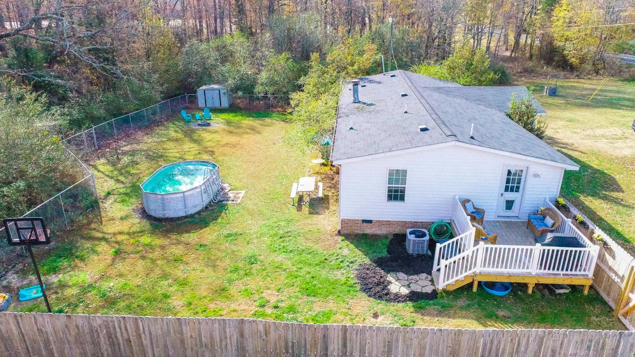 5311 Hurdle Mills Road Roxboro, NC 27574 - Photo 8 of 51 an aerial view of a house with swimming pool garden and patio