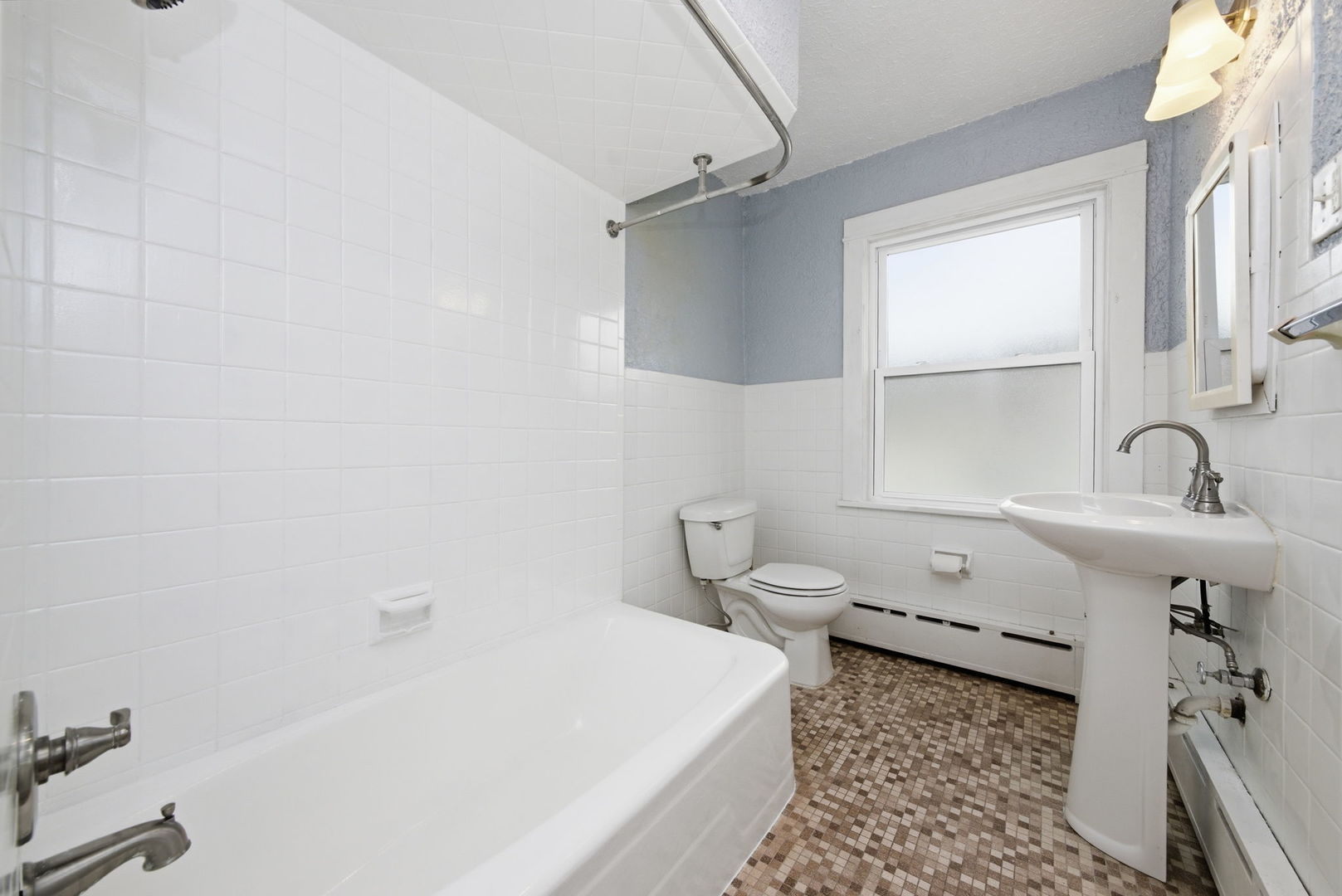 500 Catherine Street Ottawa, IL 61350 - Photo 16 of 23 a bathroom with a sink toilet and shower