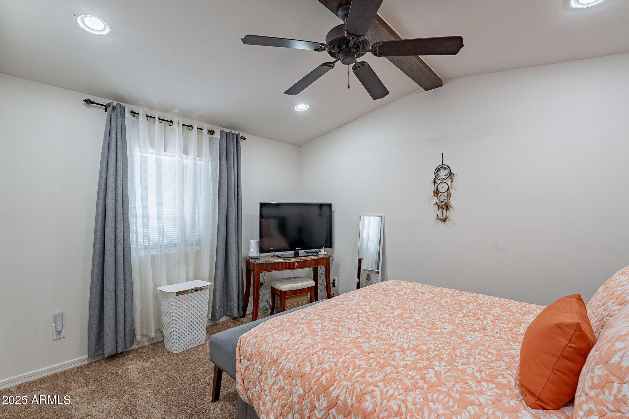 15606 South Gilbert Road, Unit 63 Chandler, AZ 85225 - Photo 12 of 21 a bedroom with a bed and a flat screen tv