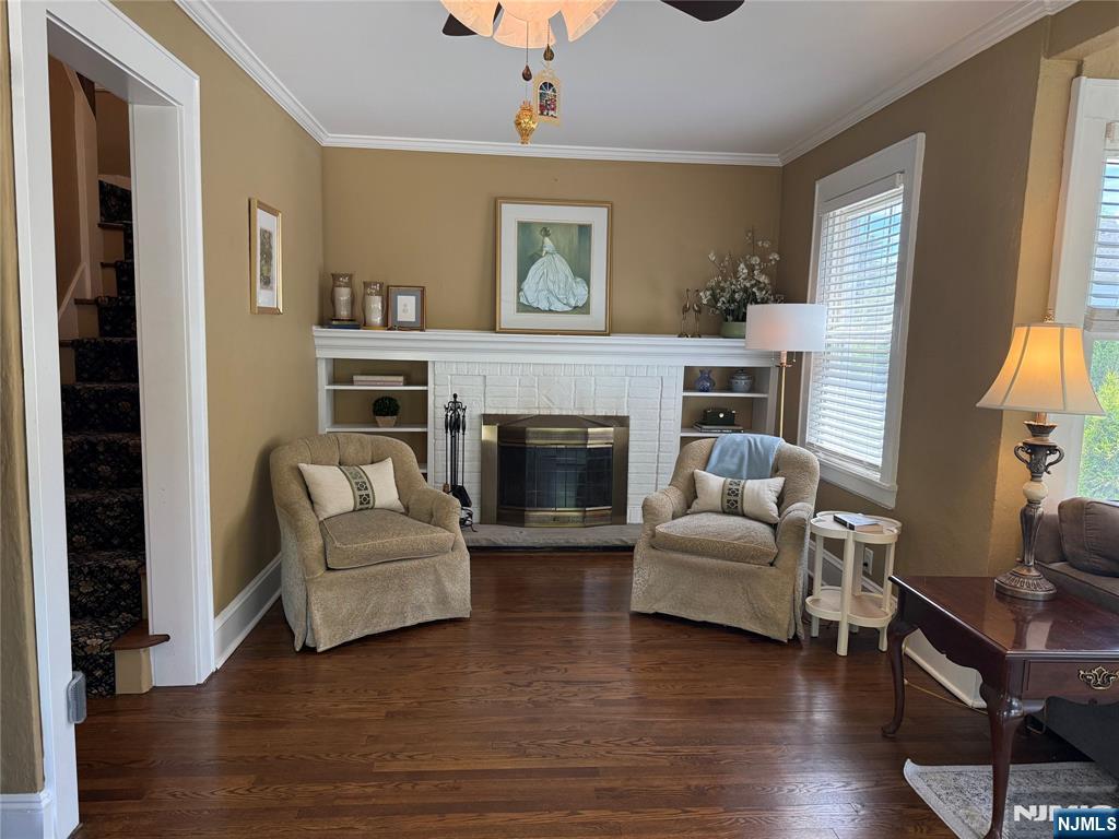 354 Demarest Avenue Oradell, NJ 07649 - Photo 7 of 33 a living room with furniture and a fireplace
