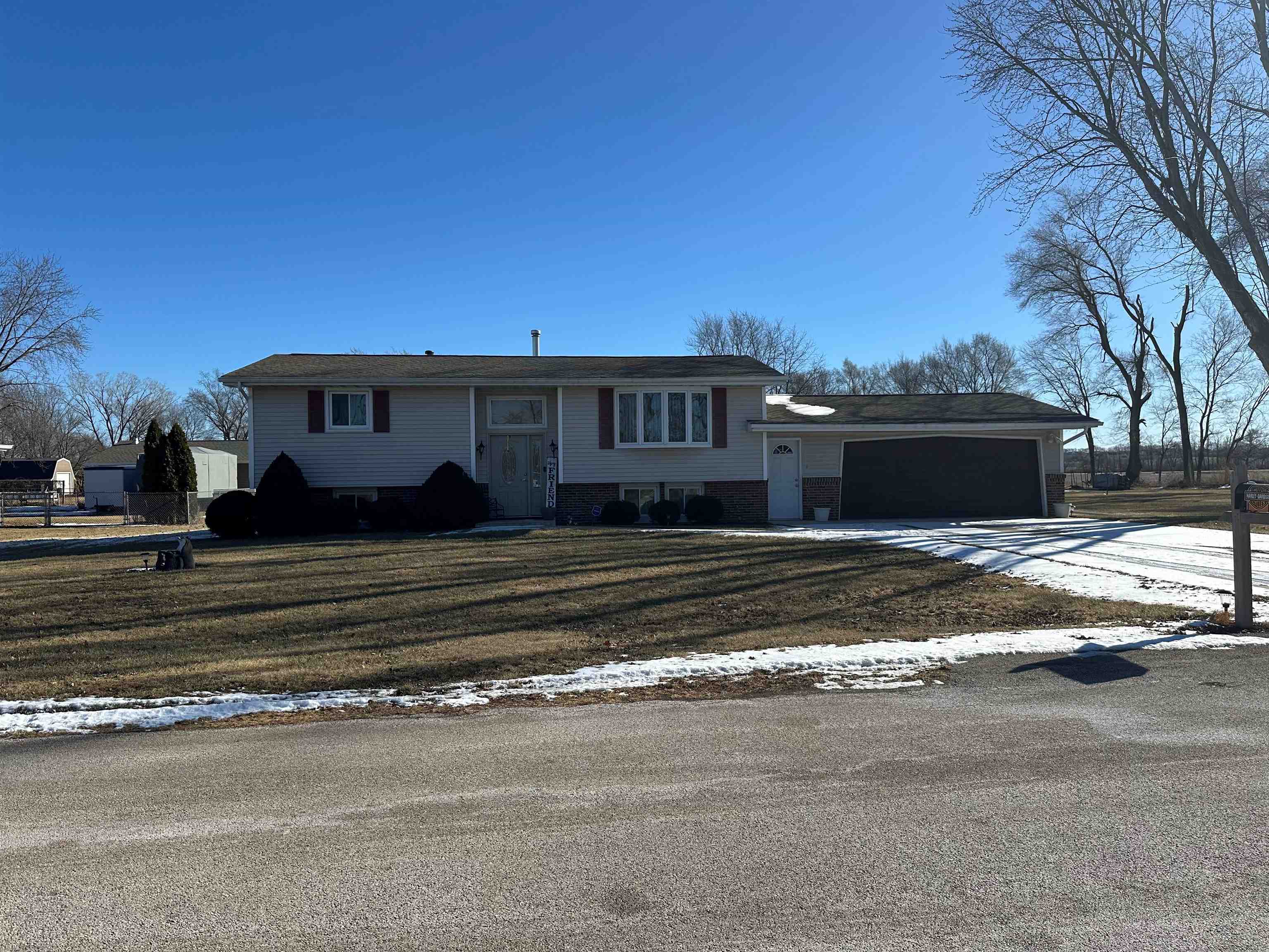 7232 Ralph Road Rockford, IL 61109 - Photo 1 of 20 a view of a house with a big yard