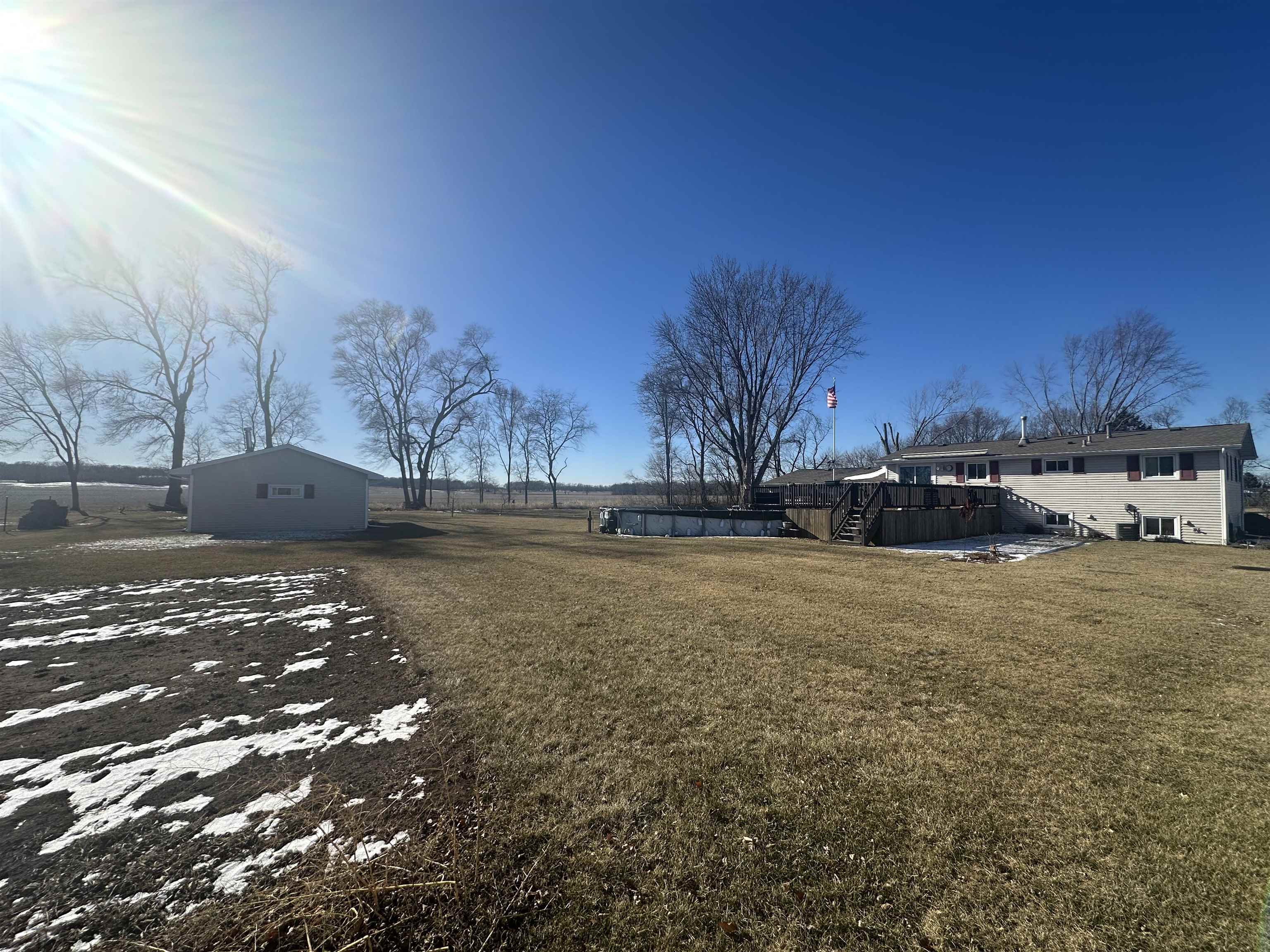 7232 Ralph Road Rockford, IL 61109 - Photo 16 of 20 a view of outdoor space with deck and yard