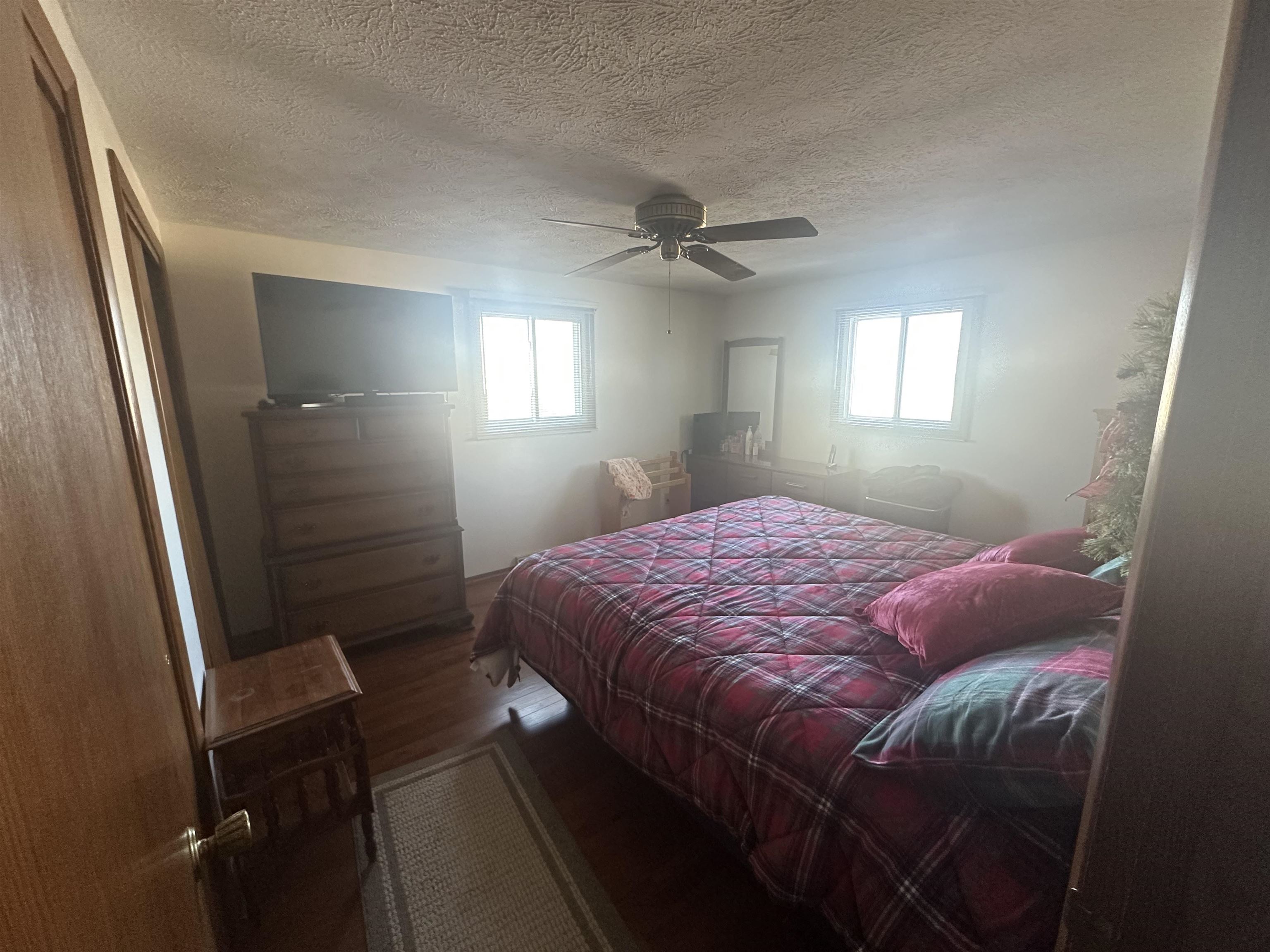 7232 Ralph Road Rockford, IL 61109 - Photo 9 of 20 a bedroom with a bed and a window