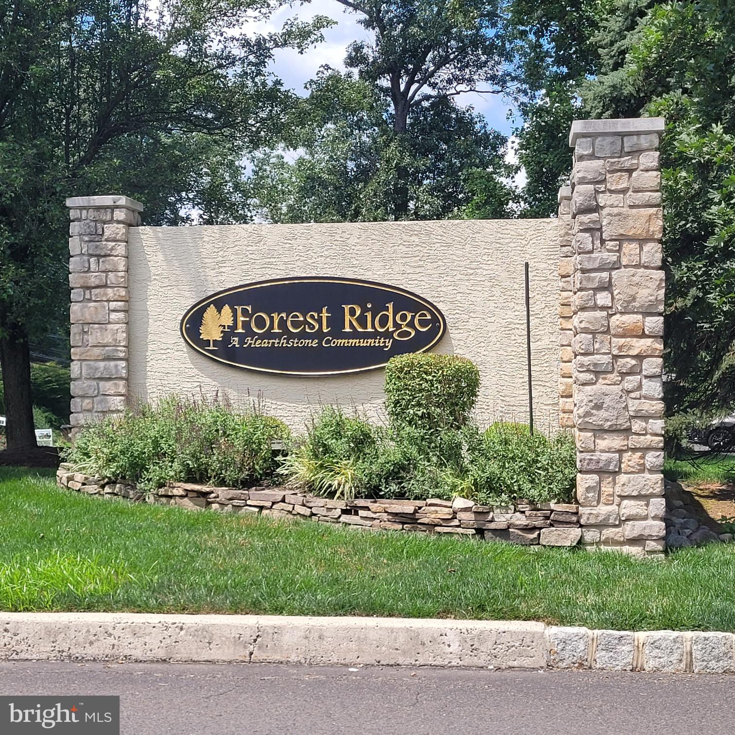 200 Beech Boulevard, Unit 301 Warrington, PA 18976 - Photo 2 of 42 a view of sign board with flower around