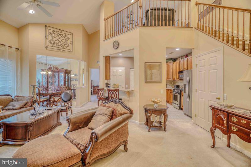 200 Beech Boulevard, Unit 301 Warrington, PA 18976 - Photo 7 of 42 a living room with furniture and a large window