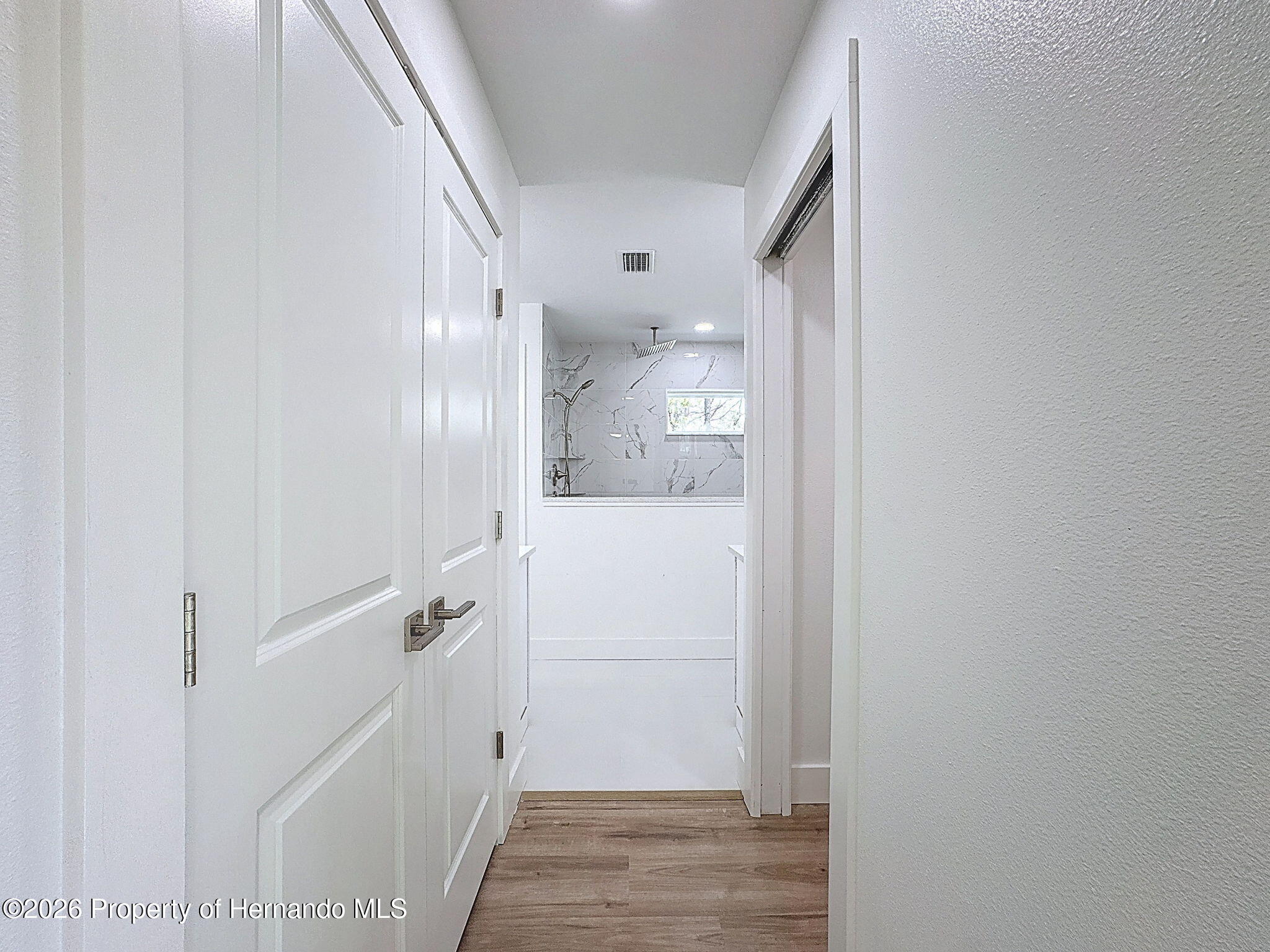 8988 Waterbird Way Weeki Wachee, FL 34613 - Photo 25 of 42 a view of a hallway