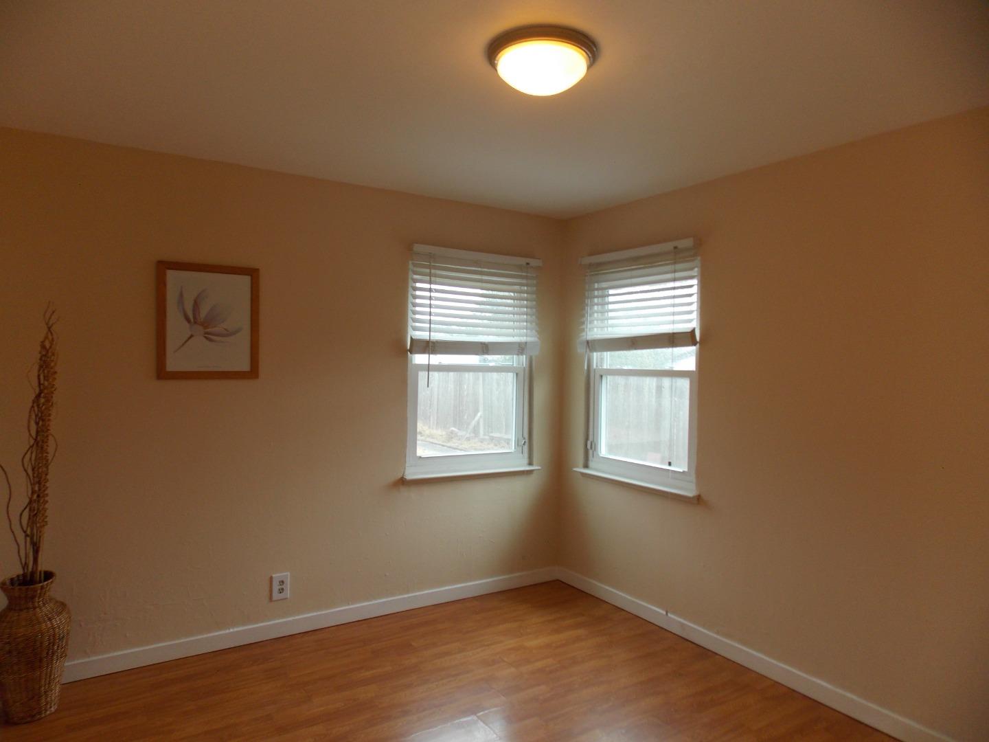 1038 Maple Avenue Vallejo, CA 94591 - Photo 4 of 13 an empty room with windows