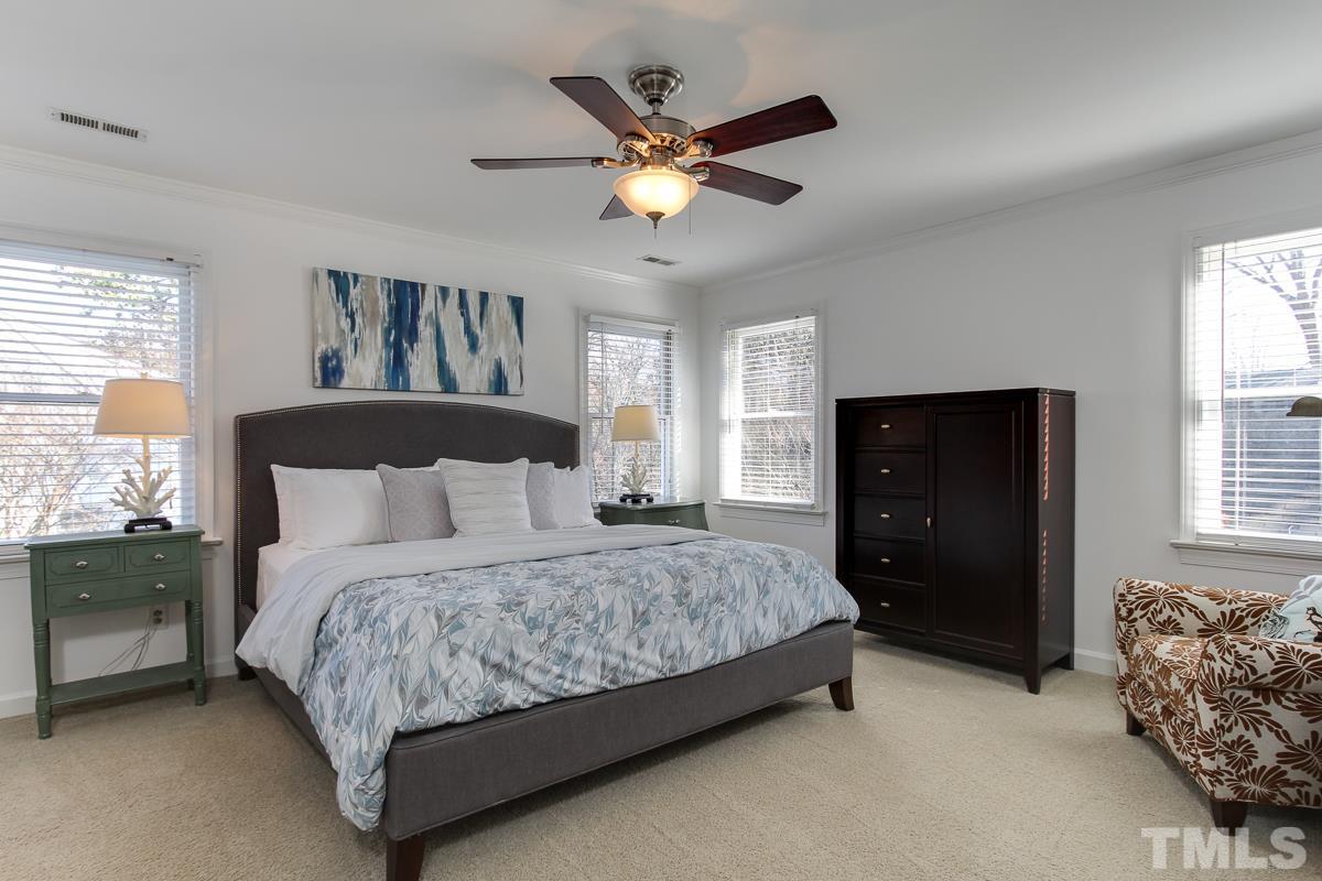 312 Dixie Trail Raleigh, NC 27607 - Photo 12 of 25 a bedroom with a bed and window