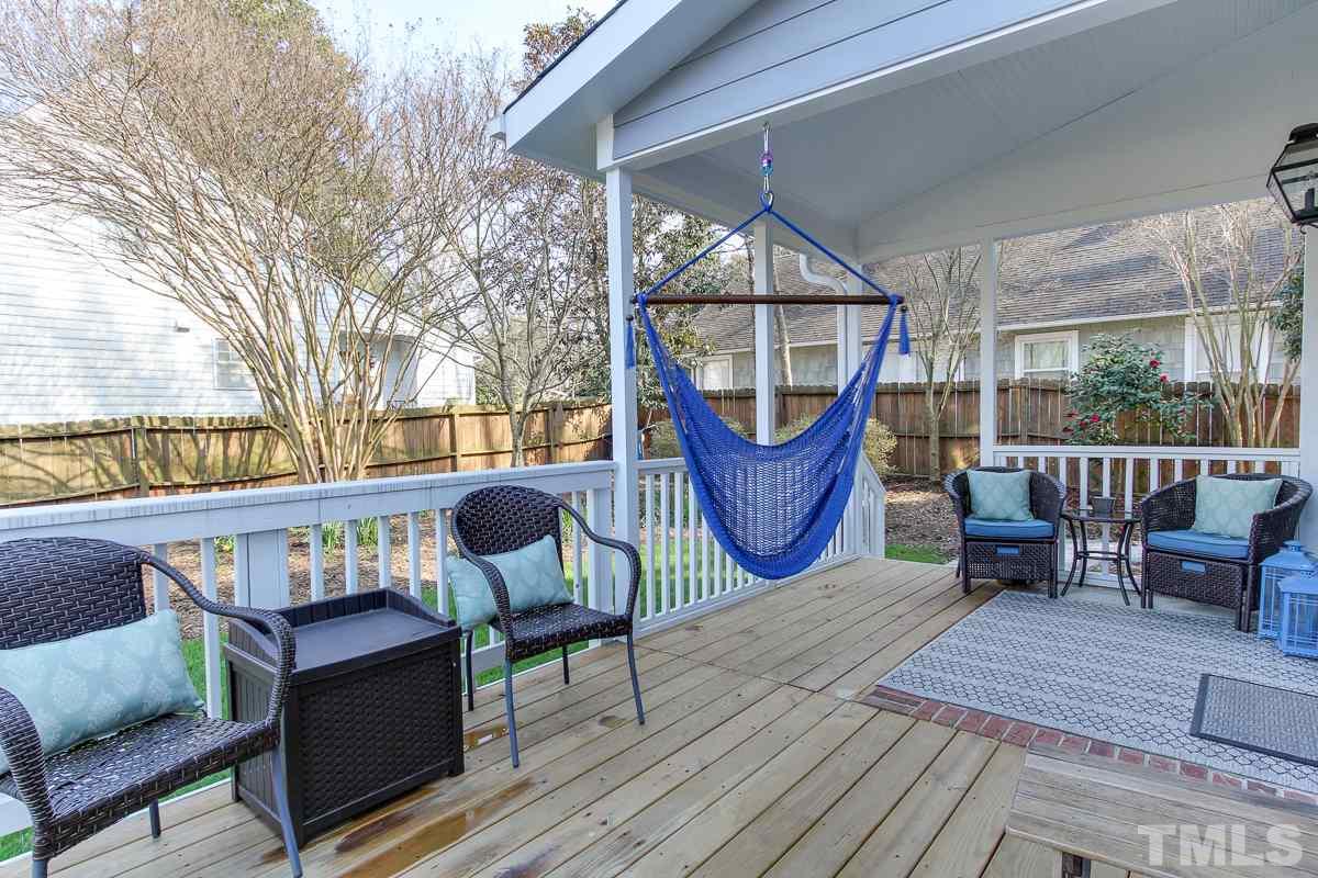 312 Dixie Trail Raleigh, NC 27607 - Photo 20 of 25 a view of living room kitchen with furniture and outdoor
