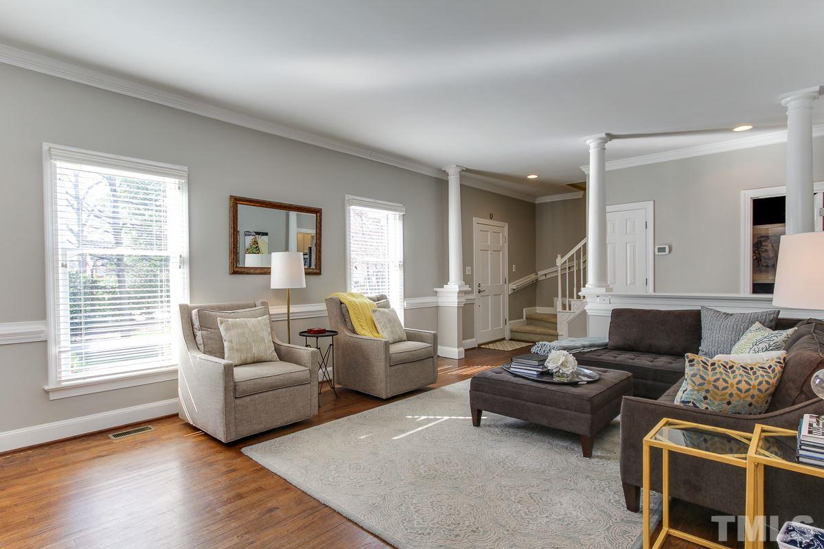 312 Dixie Trail Raleigh, NC 27607 - Photo 4 of 25 a living room with furniture and wooden floor