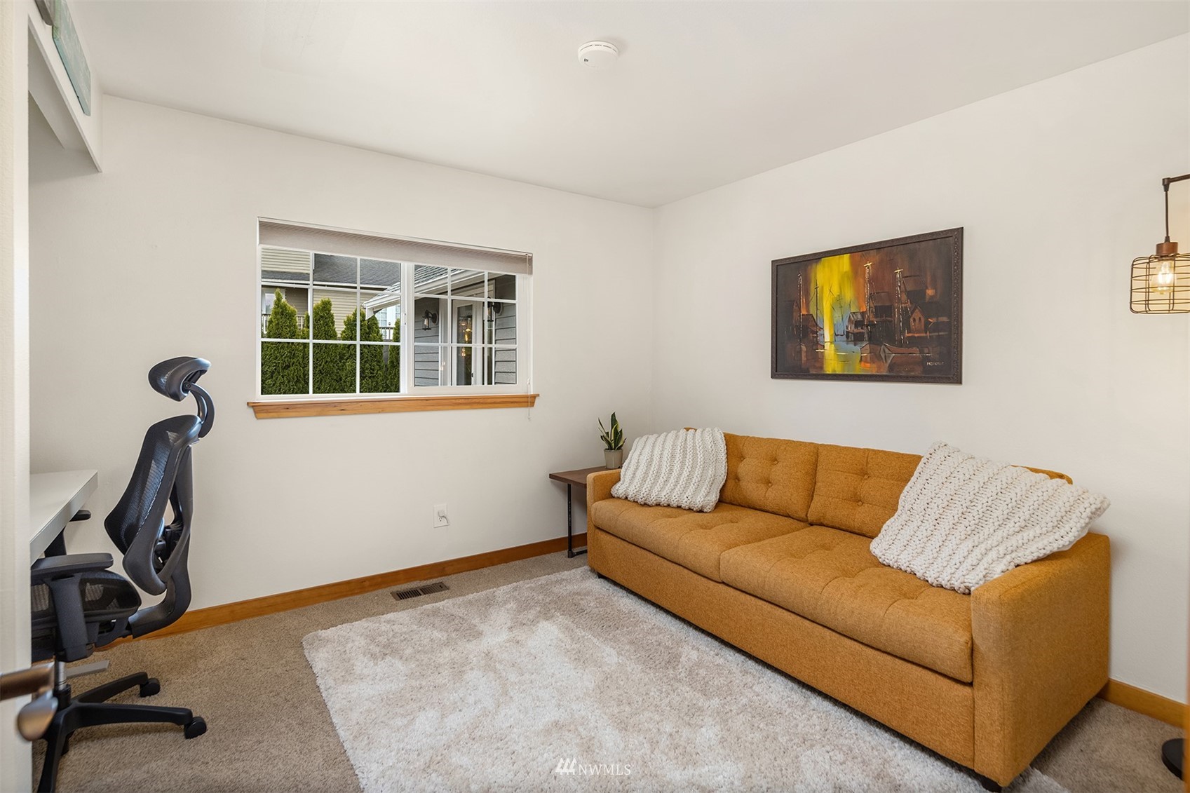 1920 233rd Place Southeast Bothell, WA 98021 - Photo 17 of 29 a living room with furniture and a window