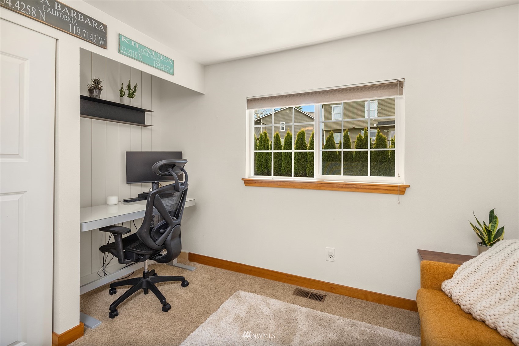 1920 233rd Place Southeast Bothell, WA 98021 - Photo 18 of 29 a view of a workspace with furniture and a window