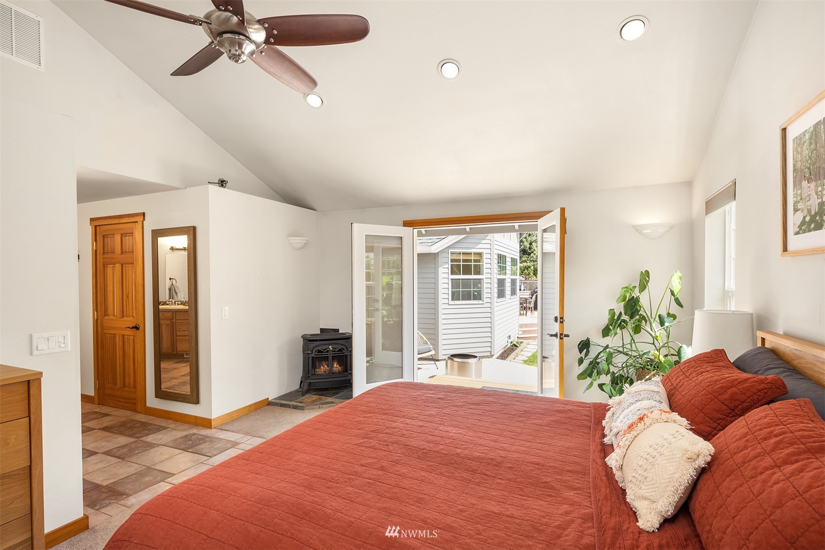 1920 233rd Place Southeast Bothell, WA 98021 - Photo 22 of 29 a bedroom with a bed and wooden floor