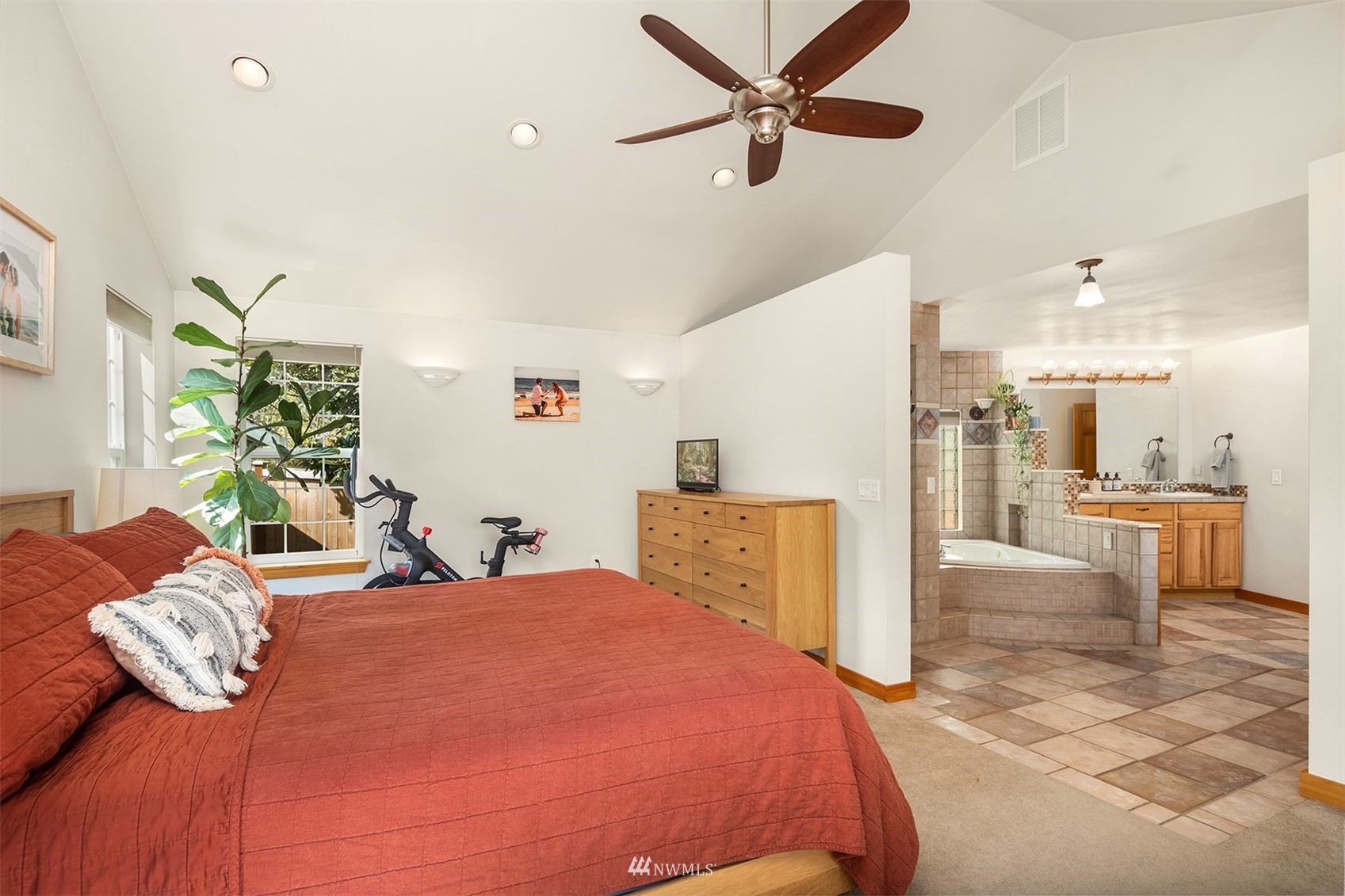 1920 233rd Place Southeast Bothell, WA 98021 - Photo 23 of 29 a bedroom with a bed and ceiling fan