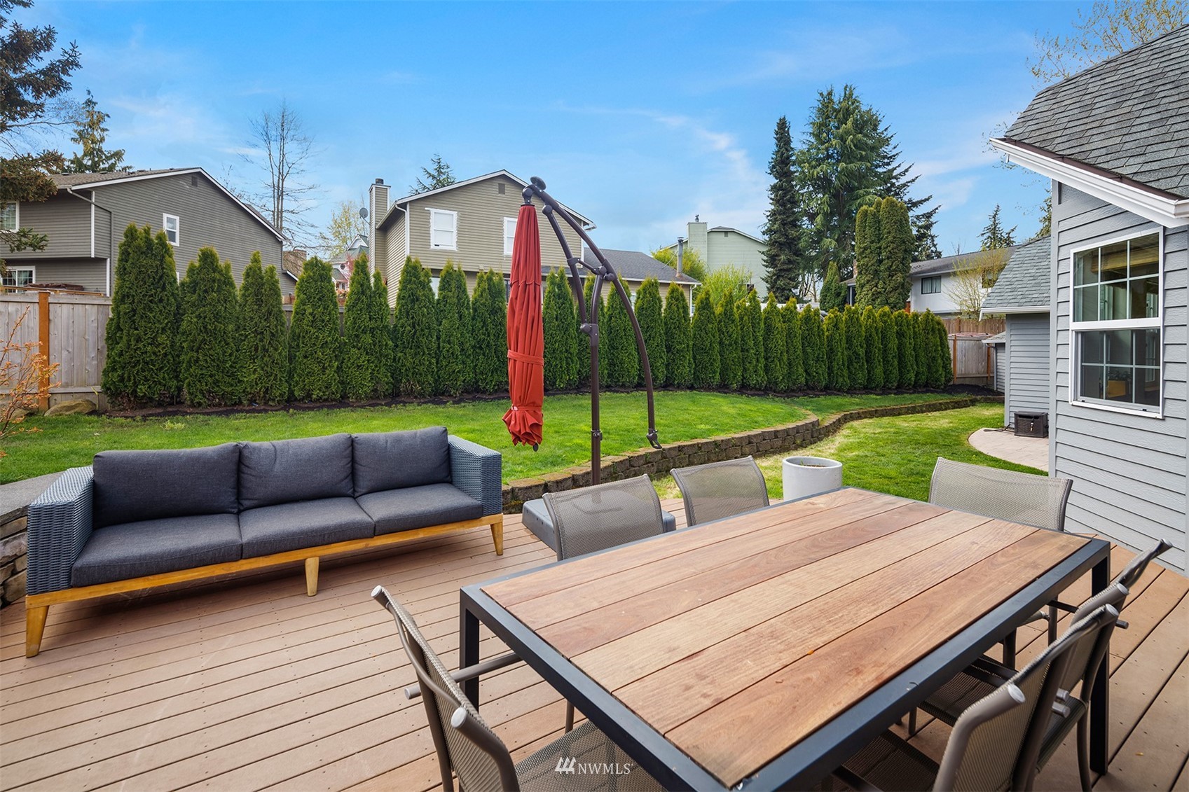 1920 233rd Place Southeast Bothell, WA 98021 - Photo 27 of 29 a view of outdoor sitting area with furniture and garden