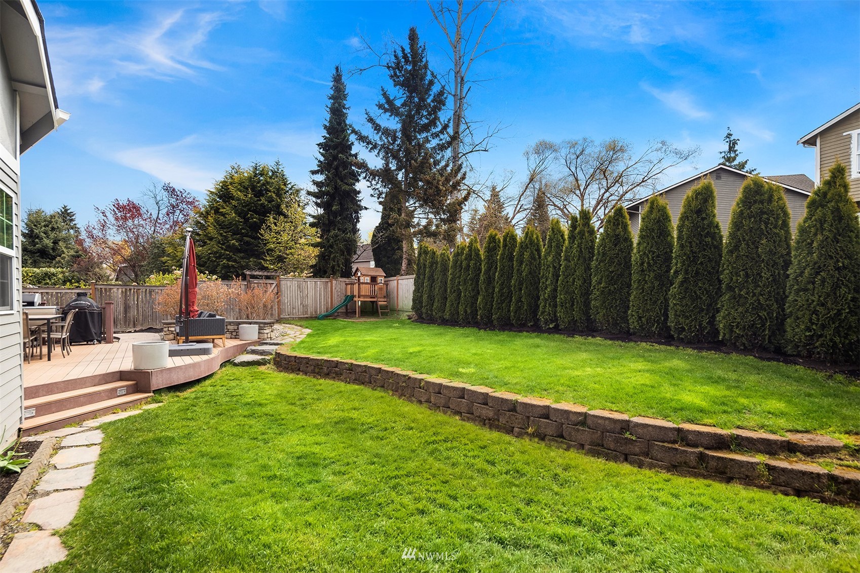 1920 233rd Place Southeast Bothell, WA 98021 - Photo 28 of 29 a view of a backyard with swimming pool