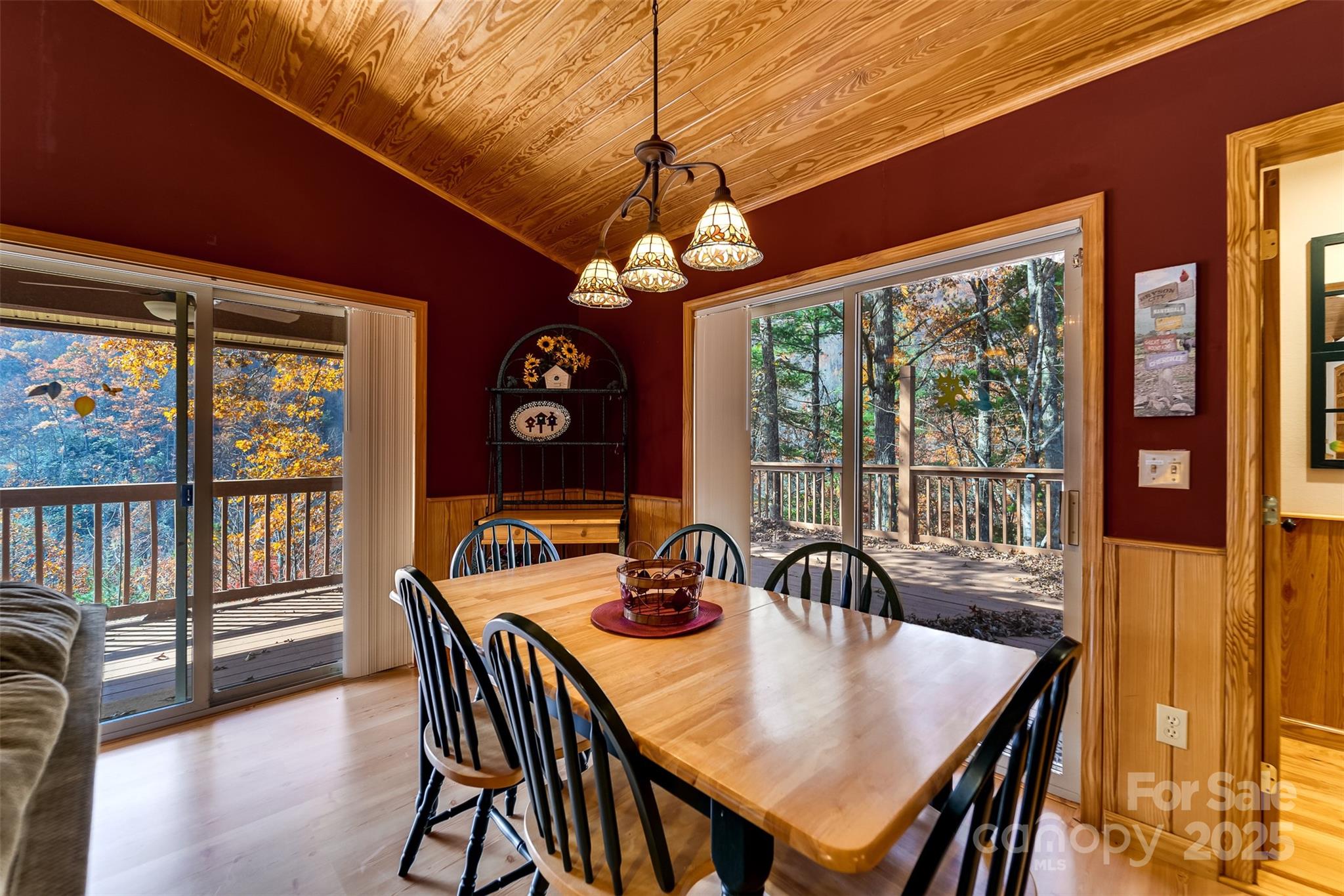 2311 Alarka Road Bryson City, NC 28713 - Photo 12 of 47 a view of a dining room with furniture window and outside view