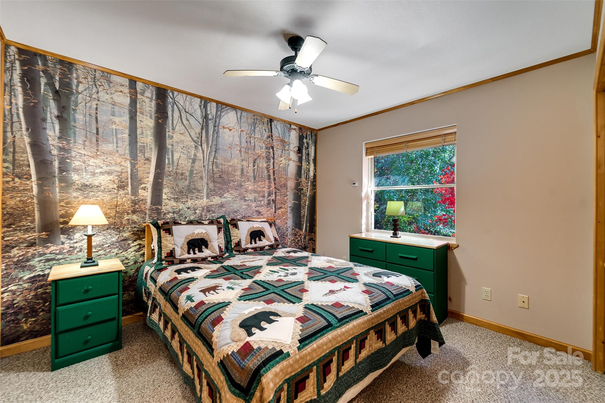 2311 Alarka Road Bryson City, NC 28713 - Photo 18 of 47 a bed sitting in a bedroom next to a window